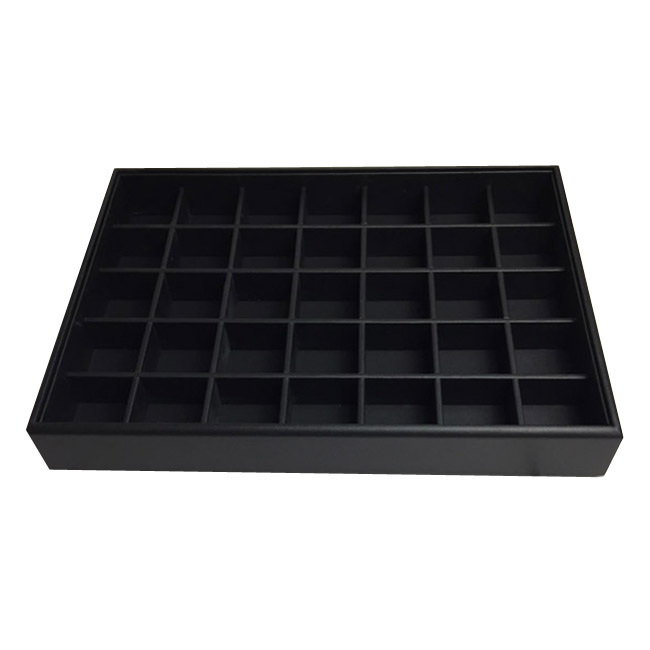 1 x Black Premium Leatherette Display Tray With 35 Compartments. Stackable. Dim 315(w) x 225(d) x 45mm(h). 1 x Black Premium Leatherette Display Tray With 35 Compartments. Stackable. Dim 315(w) x 225(d) x 45mm(h).