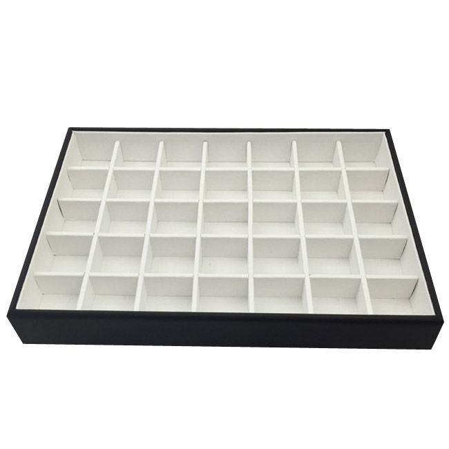 1 x Black and White Premium Leatherette Display Tray With 35 Compartments. Stackable. Dim 315(w) x 225(d) x 45mm(h). 1 x Black and White Premium Leatherette Display Tray With 35 Compartments. Stackable. Dim 315(w) x 225(d) x 45mm(h).