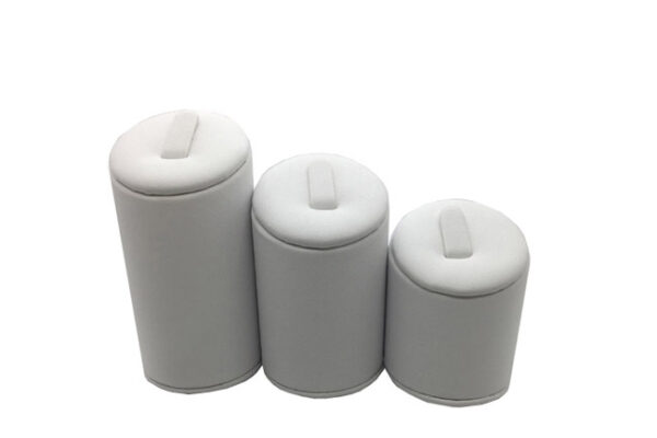Set Of Three White Leatherette Ring Displays. Varying Heights.