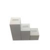 Set Of Three Square White Leatherette Ring Displays. Varying Heights.